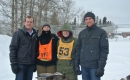 Trent Wotherspoon with volunteers and racers at the Canadian Dogsled Championship