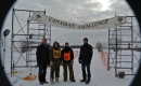 Trent Wotherspoon with racers and volunteers at Canadian Dogsled Championship